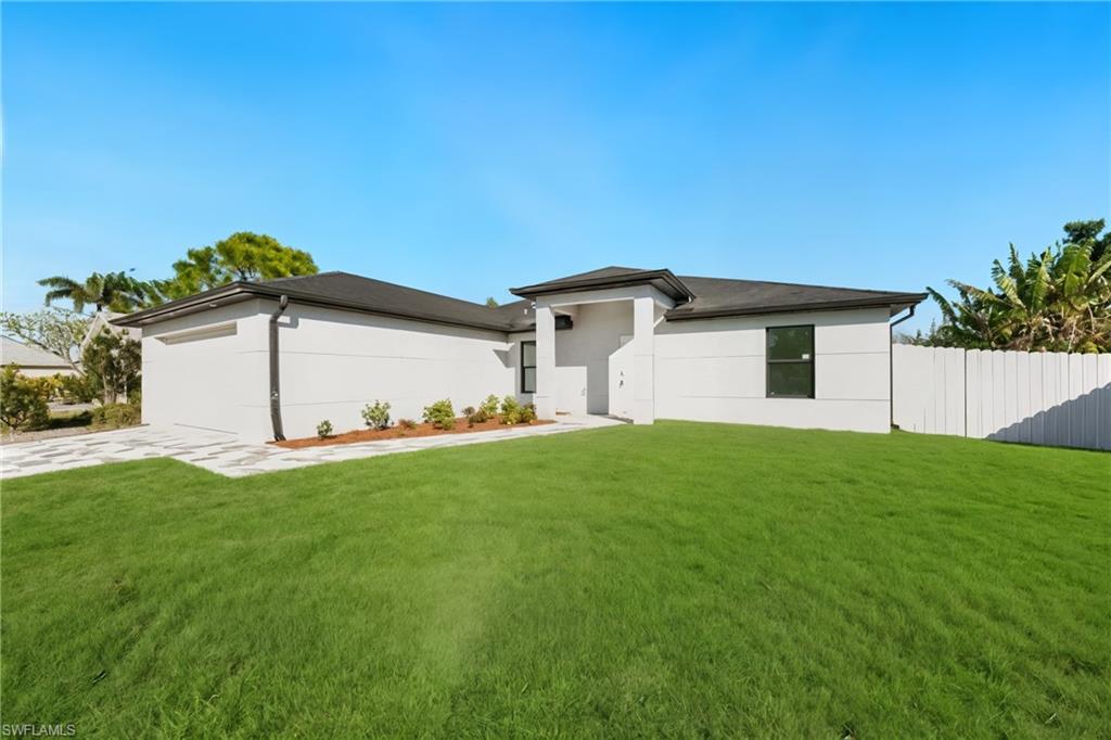 Prairie-style house featuring stucco siding