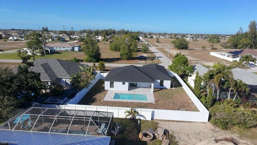 Aerial view of residential area with a pool area