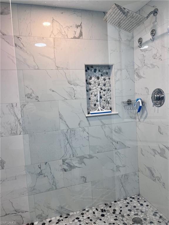 Bathroom with tiled shower