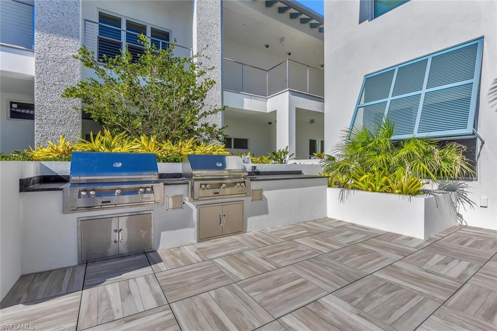 View of patio / terrace with area for grilling and exterior kitchen