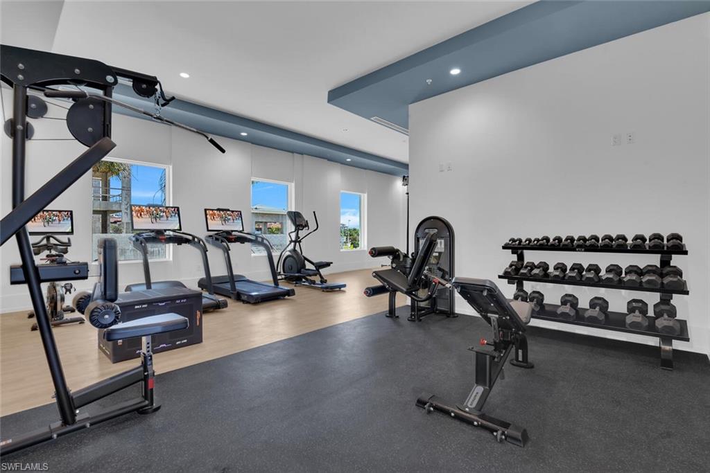 Workout area with wood-type flooring