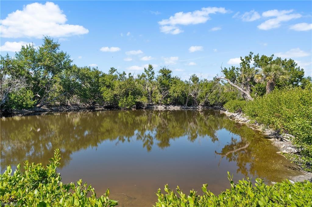 Positioned along peaceful lake waters, this home captures the quiet beauty of Sanibel.