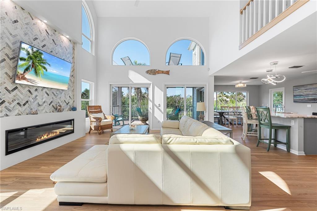 A brand-new marble fireplace adds a refined modern touch to the main living area.