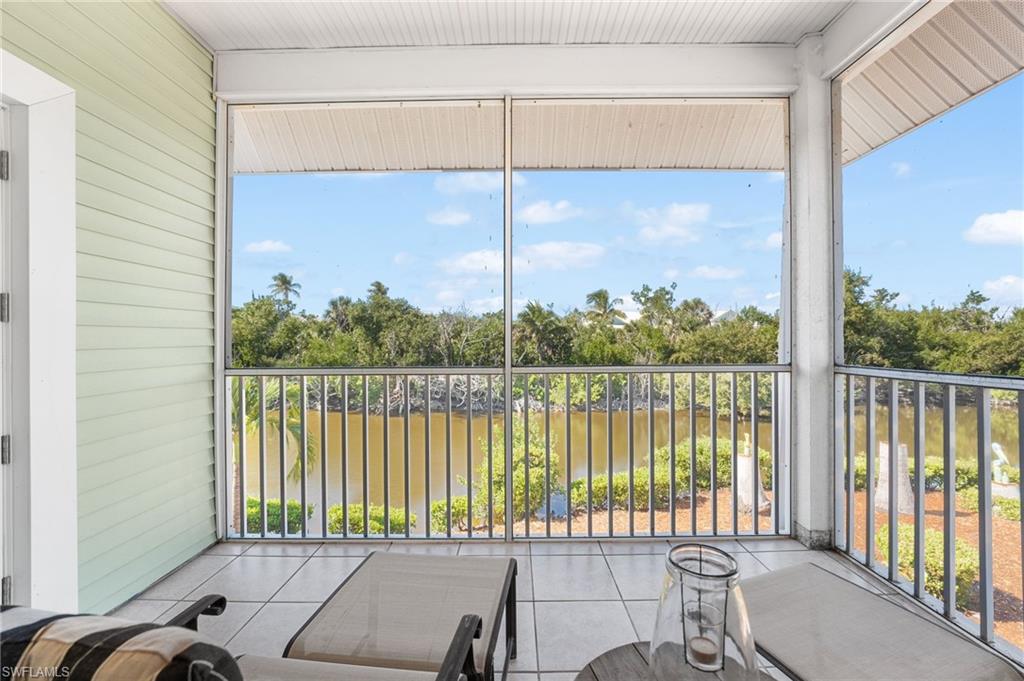 A guest room with its own screened balcony creates a peaceful escape for visitors.