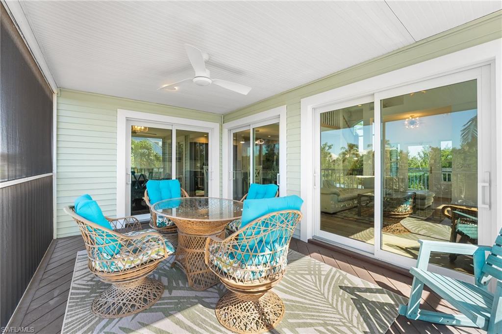 The spacious screened balcony offers the perfect place to enjoy lake breezes and morning coffee.