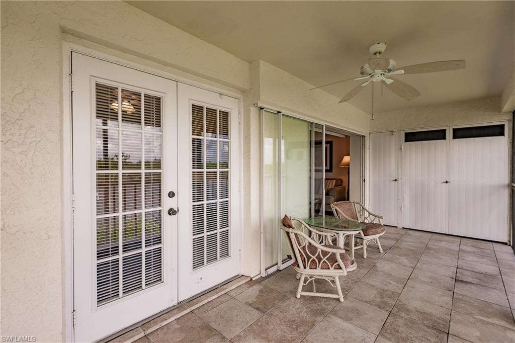 Sunroom featuring ceiling fan