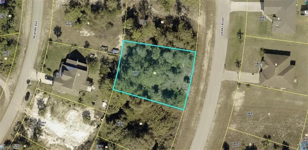Aerial view of property's location featuring property parcel outlined