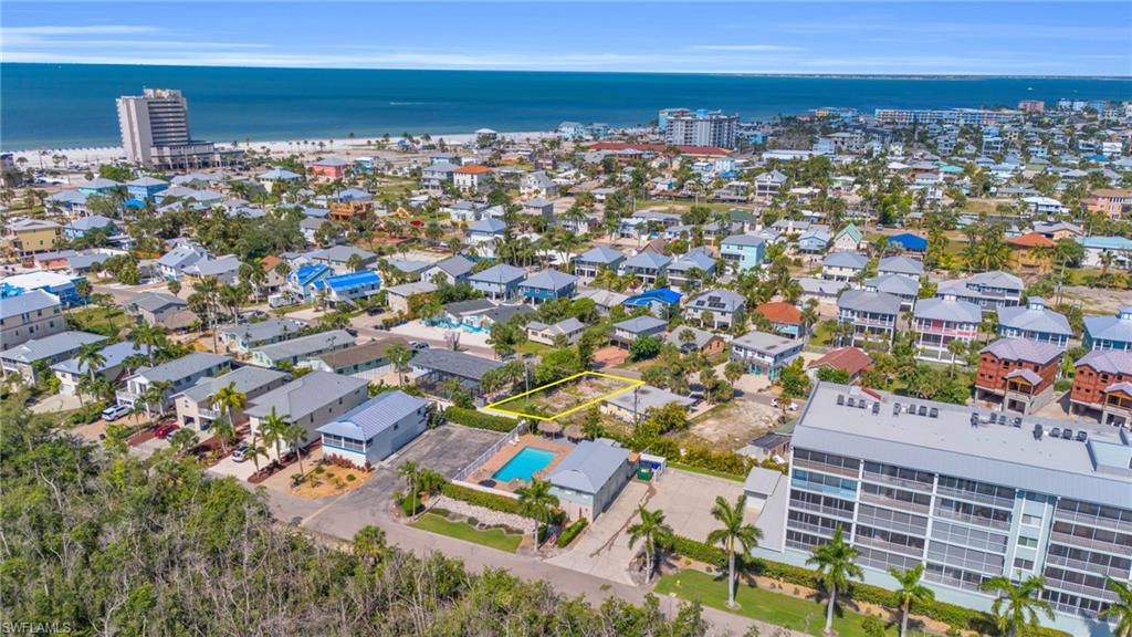 Drone / aerial view featuring a water viewLot lines do not represent the surveyVirtually enhanced