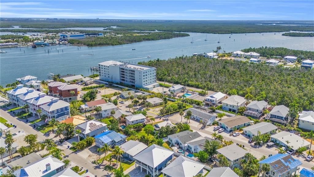 Birds eye view of property featuring a water viewLot lines do not represent the surveyVirtually enhanced