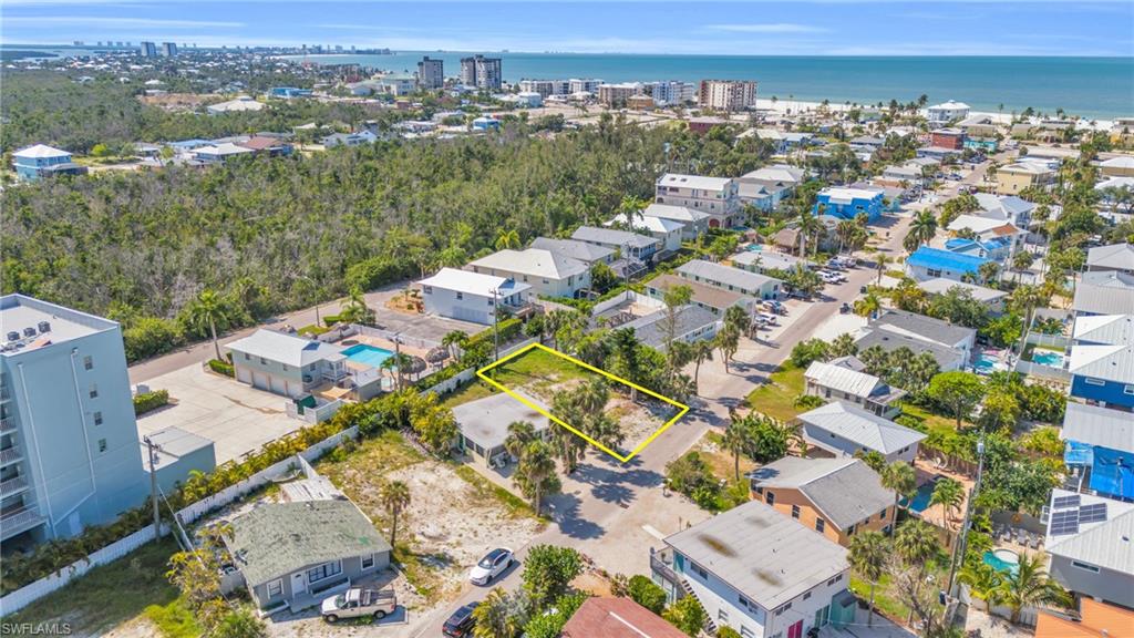 Drone / aerial view featuring a water viewLot lines do not represent the surveyVirtually enhanced