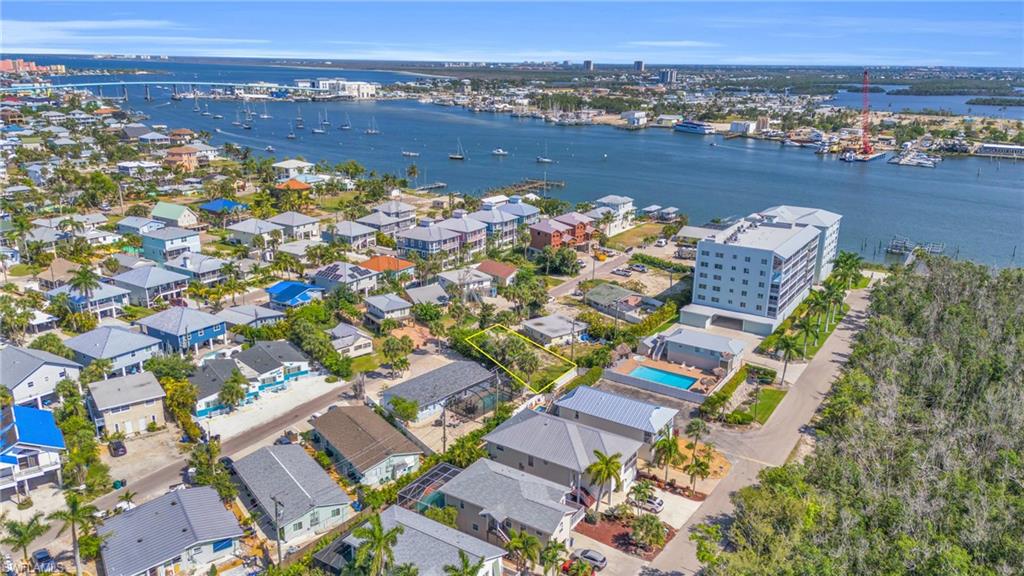 Birds eye view of property with a water viewLot lines do not represent the surveyVirtually enhanced