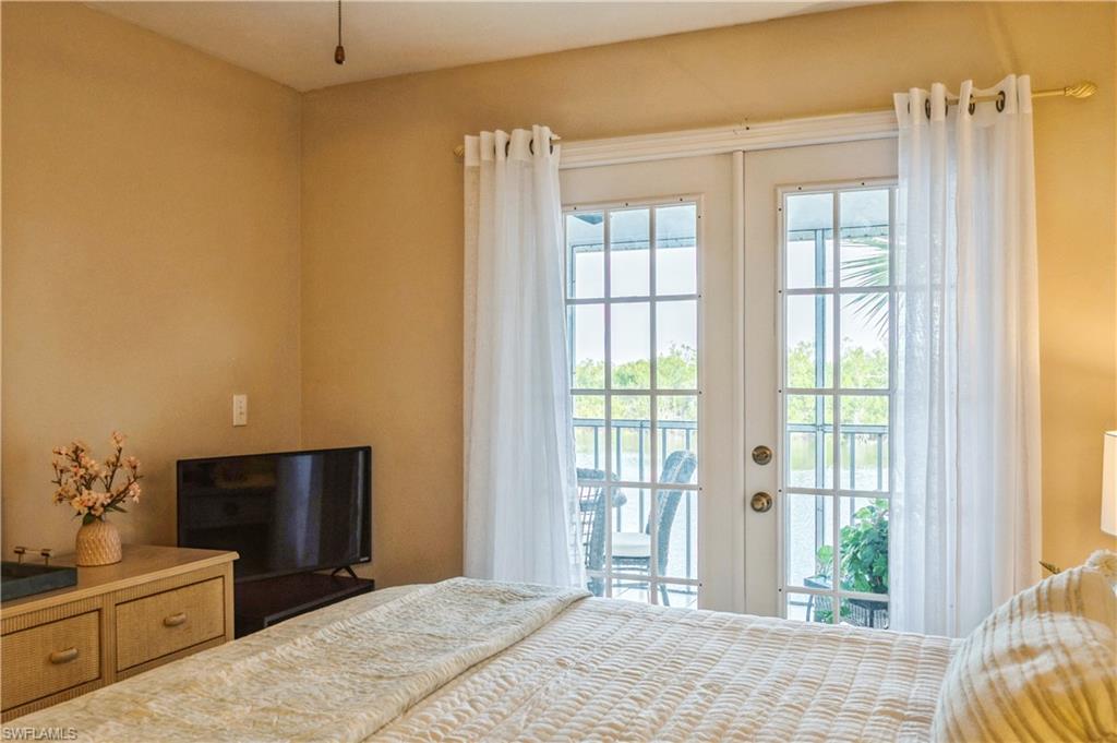 Bedroom featuring access to outside and french doors