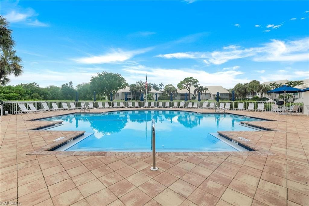 Community pool featuring a patio area