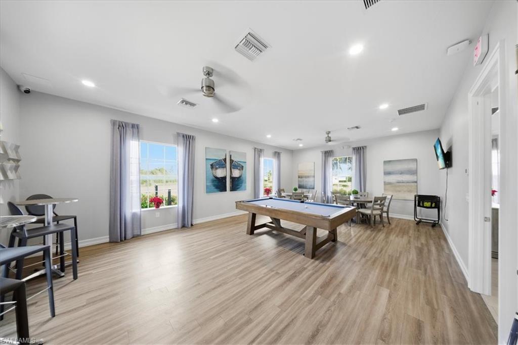 Recreation room featuring billiards, ceiling fan, and recessed lighting