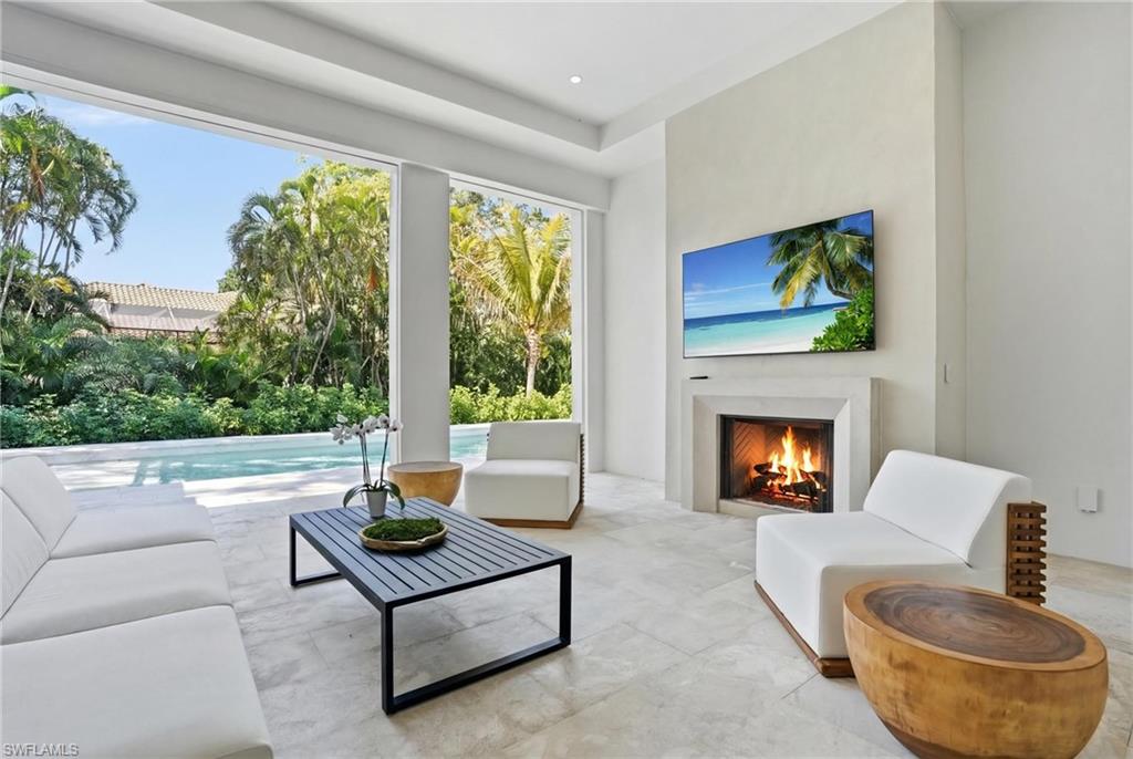 Living room with a high end fireplace