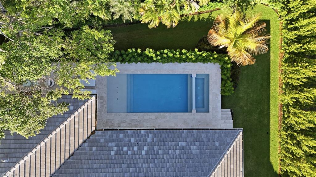 Drone / aerial view of a pool area