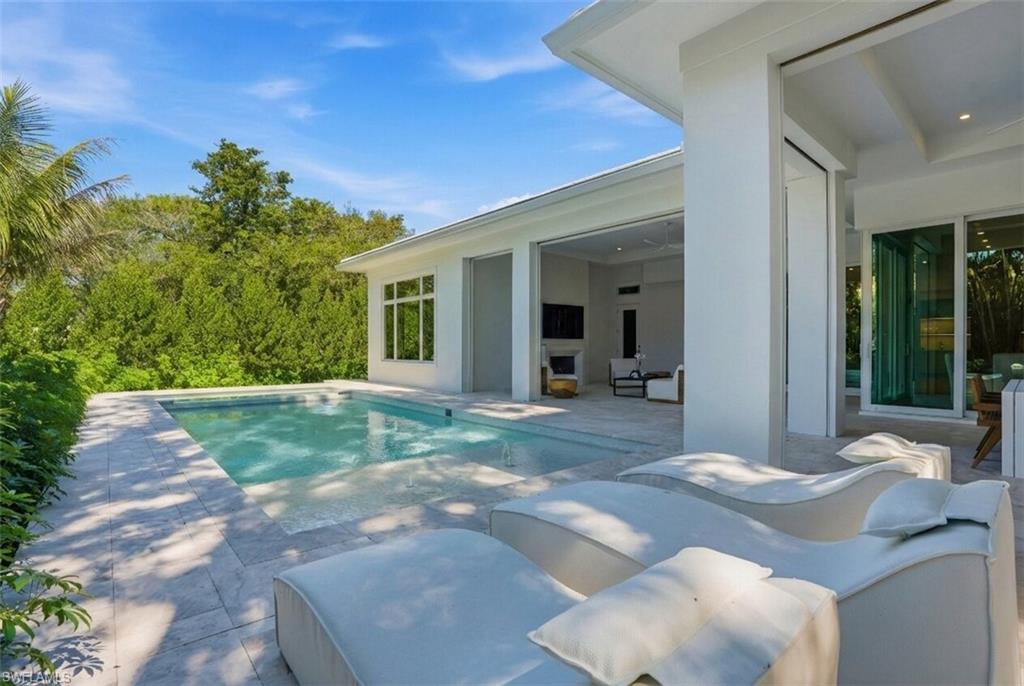 Swimming pool featuring a patio area