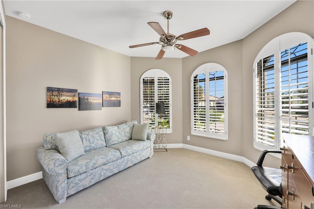 Office space featuring carpet flooring and ceiling fan