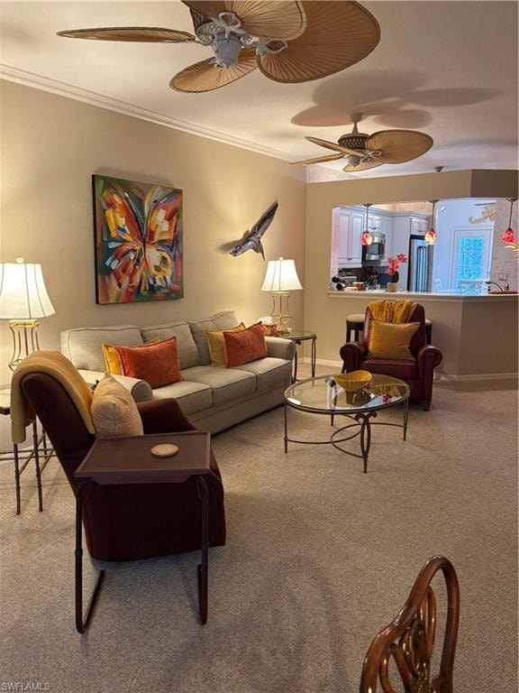 Living area featuring carpet floors, and crown molding