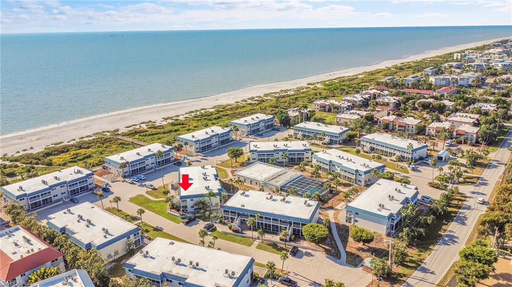Just a few steps carry you from your front door to the white-sand beaches of Sanibel Island, where mornings begin with seashells glittering in the tide and evenings melt into watercolor sunsets.