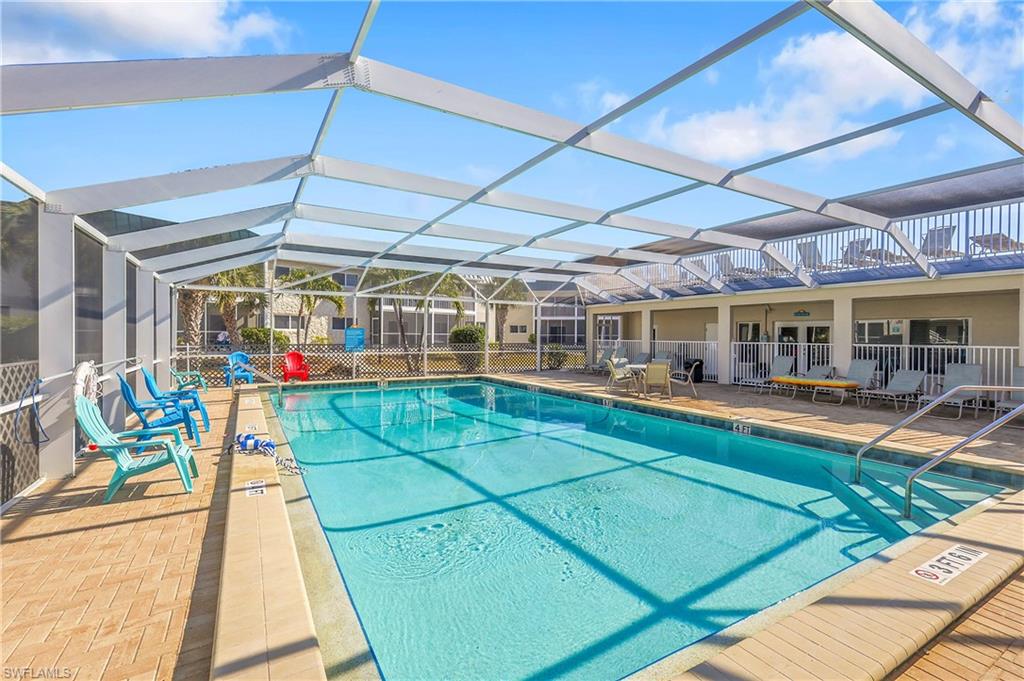 A large screened community pool offers relaxed swimming and shaded lounging without the bugs.