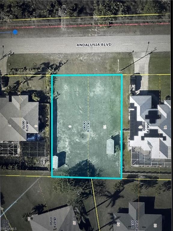 Aerial overview of property's location featuring property boundaries highlighted