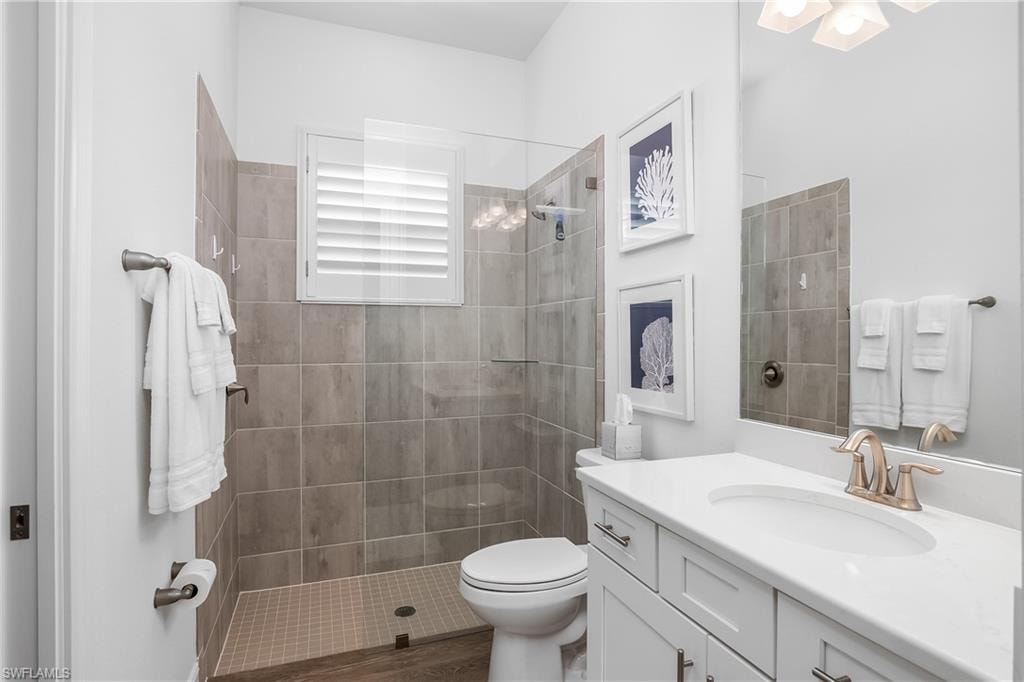 Full bath with vanity and walk in shower