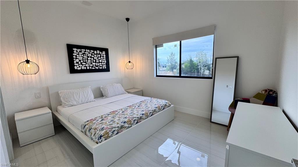 Bedroom with baseboards