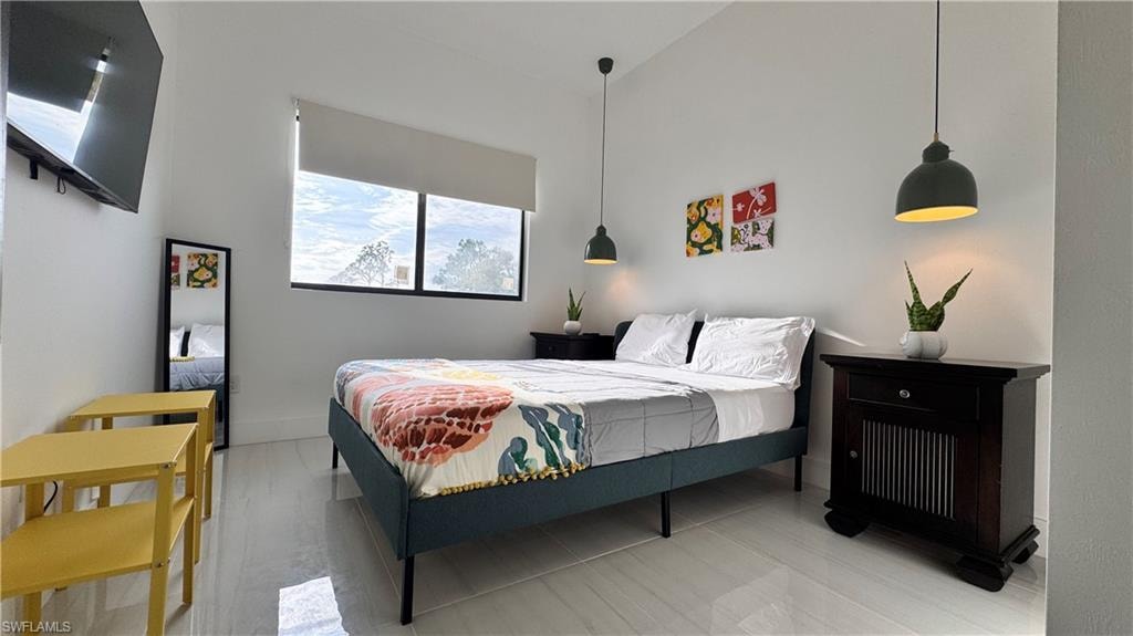 Bedroom with baseboards