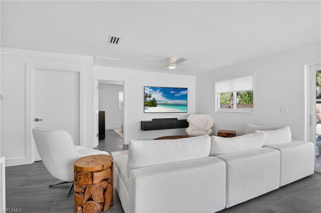 Living area featuring ceiling fan