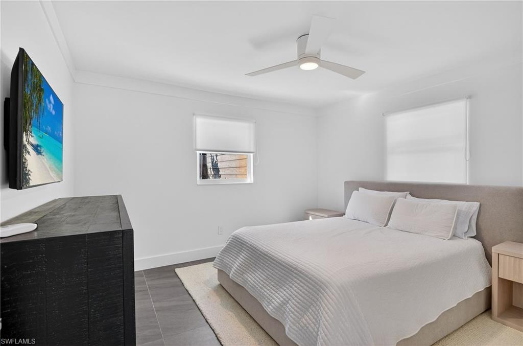 Bedroom featuring baseboards and a ceiling fan