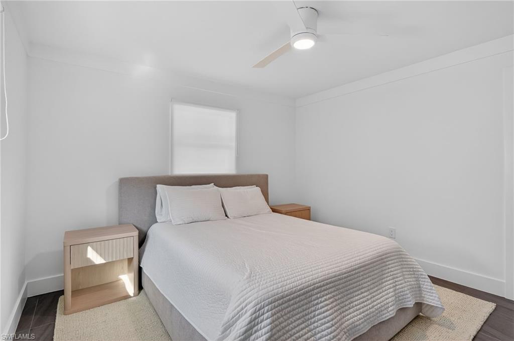 Bedroom with baseboards and ceiling fan