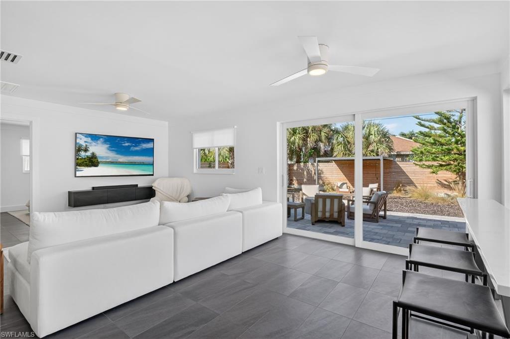 Living area featuring ceiling fan