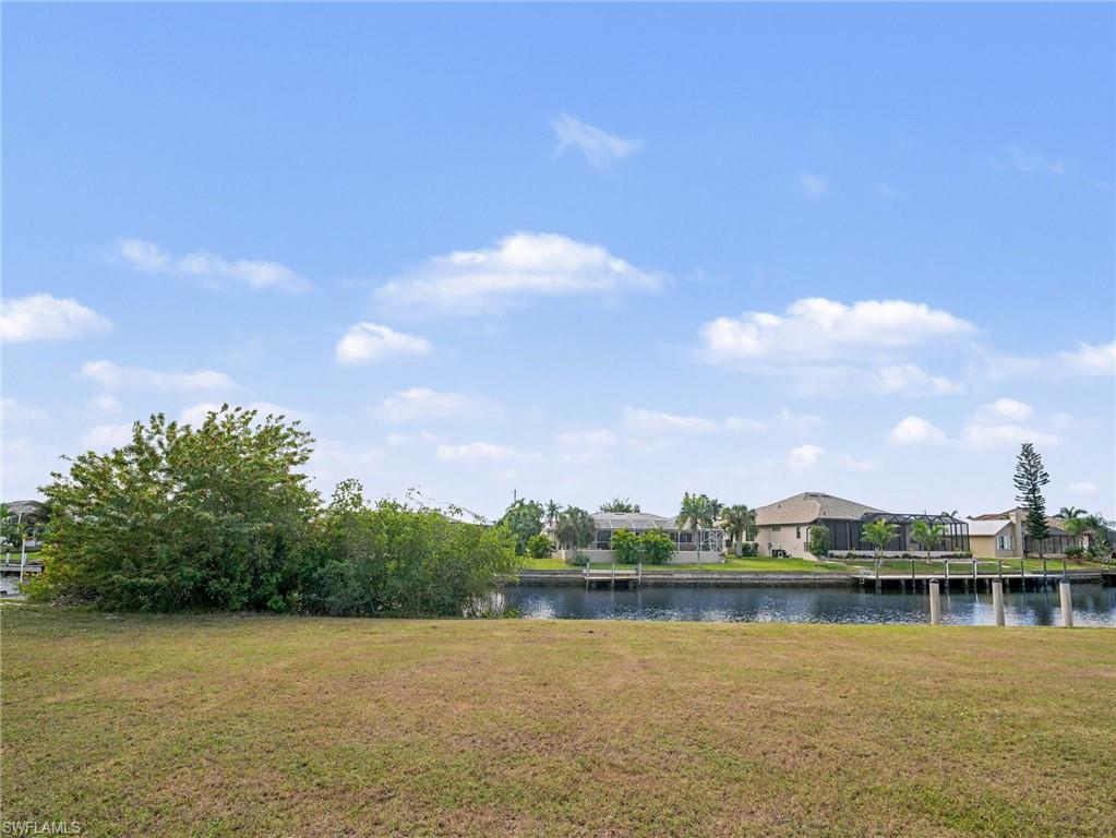 Water view with nearby suburban area