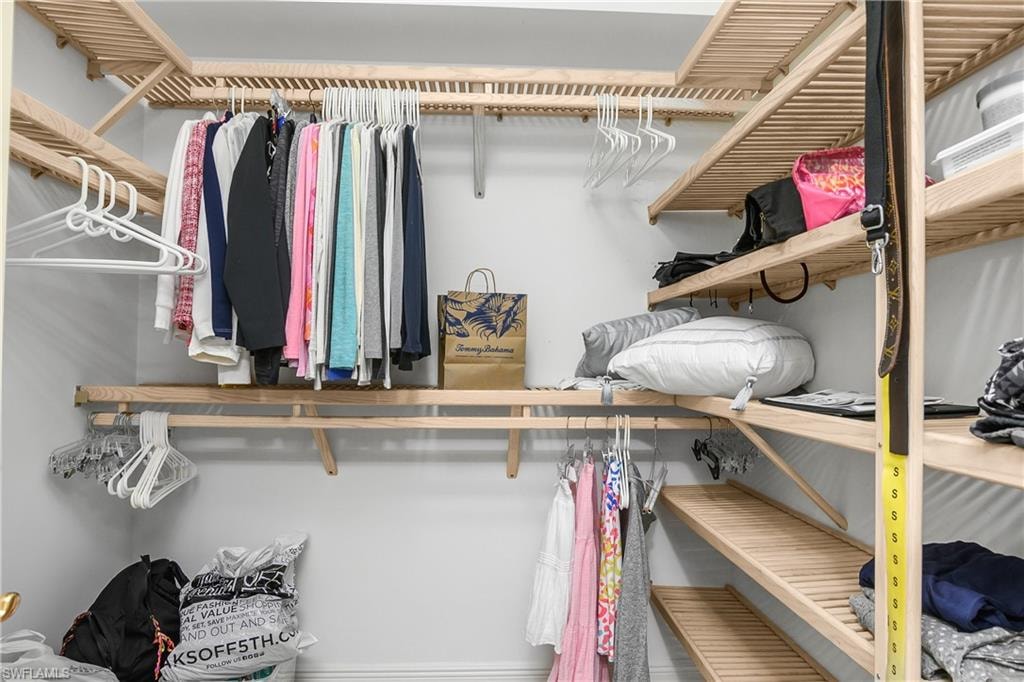 Primary walk in closet plus adjacent closet