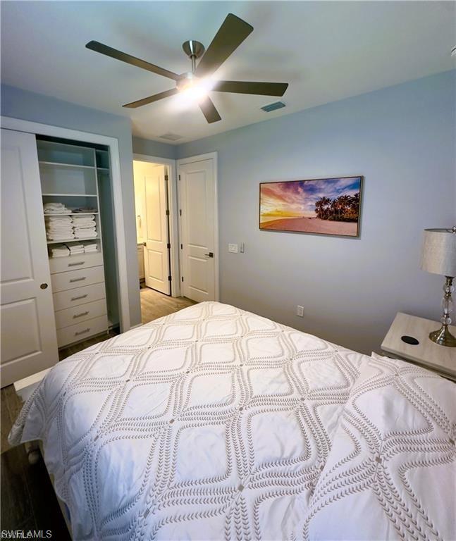 Bedroom with a closet and a ceiling fan