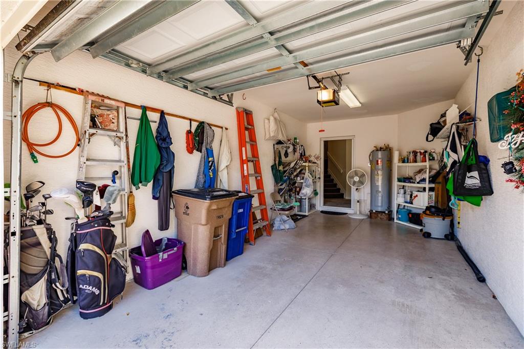 Garage featuring water heater