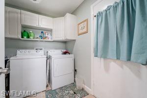 Laundry room with lots of storage cabinets