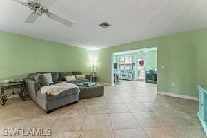 Large living room leading to den / office