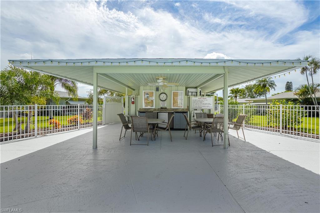View of patio / terrace featuring outdoor dining area and a ceiling fan