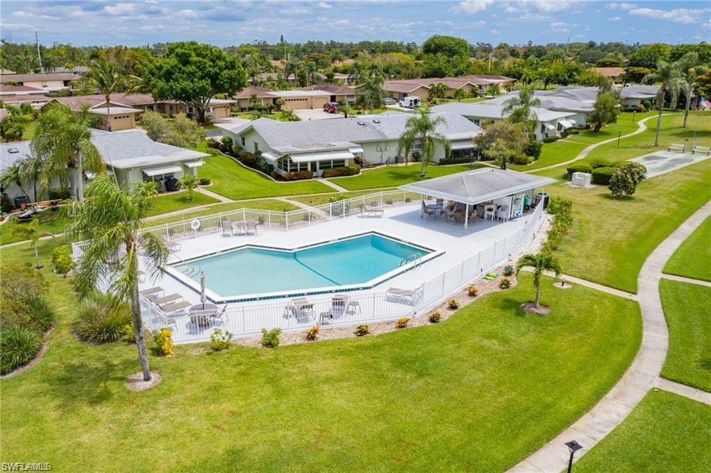 Aerial view of residential area with a pool
