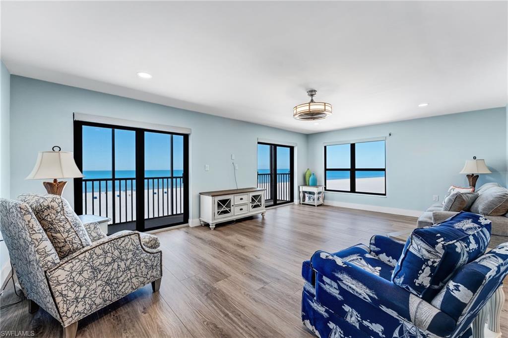WOW check out the view!!!   Living area featuring recessed lighting and wood finished floors
