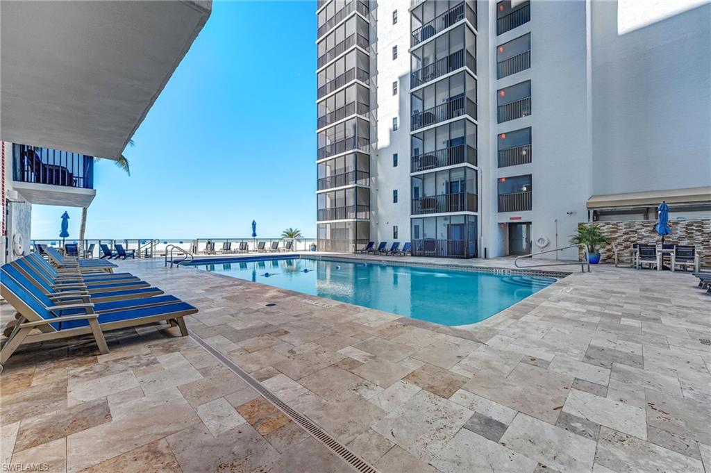 Community pool featuring a patio area