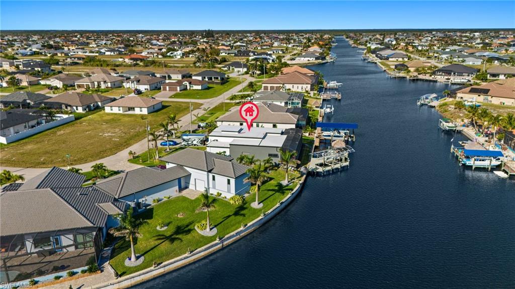 Aerial view of residential area with a large body of water