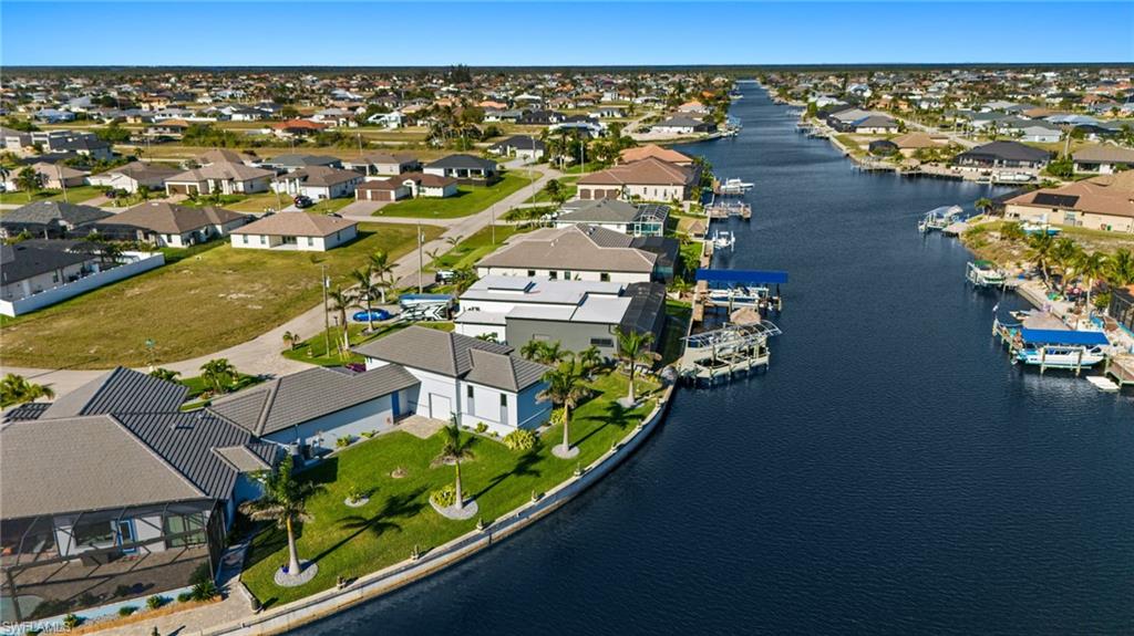 Aerial view of residential area with a nearby body of water