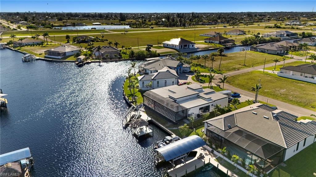 Aerial view of residential area with a large body of water