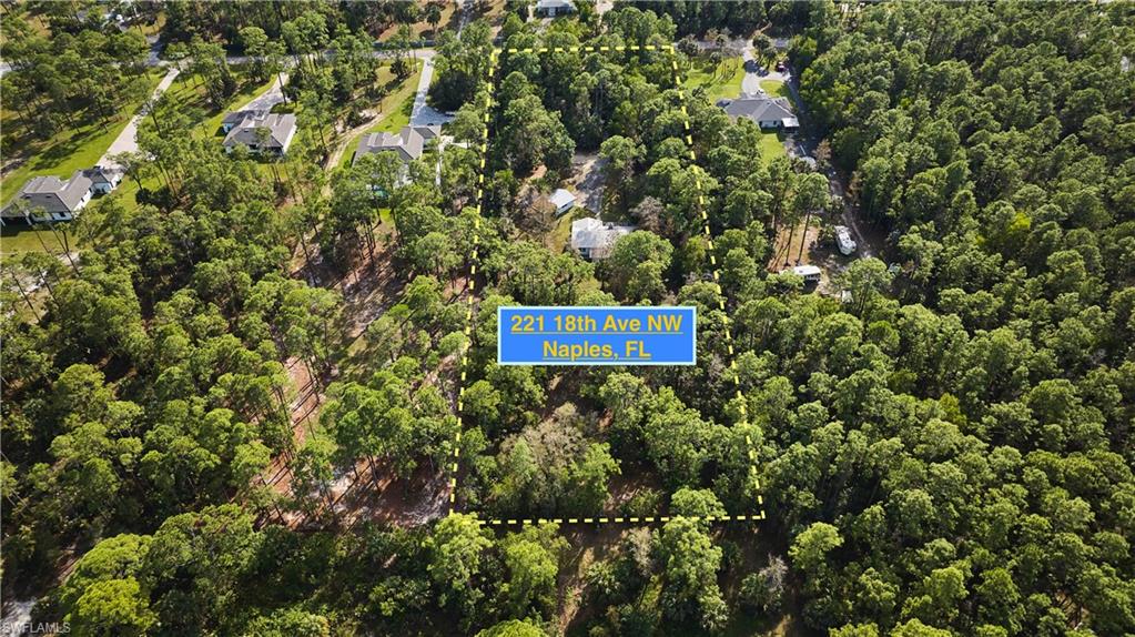 Aerial overview of property's location featuring a forest