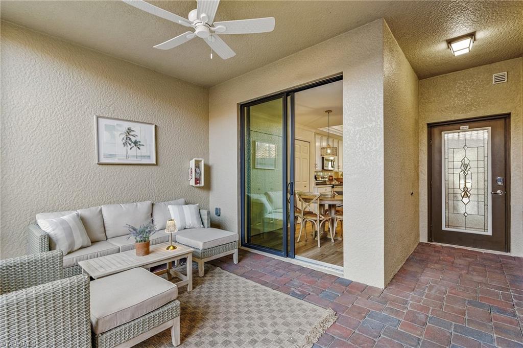 Outdoor Living room with ceiling fan