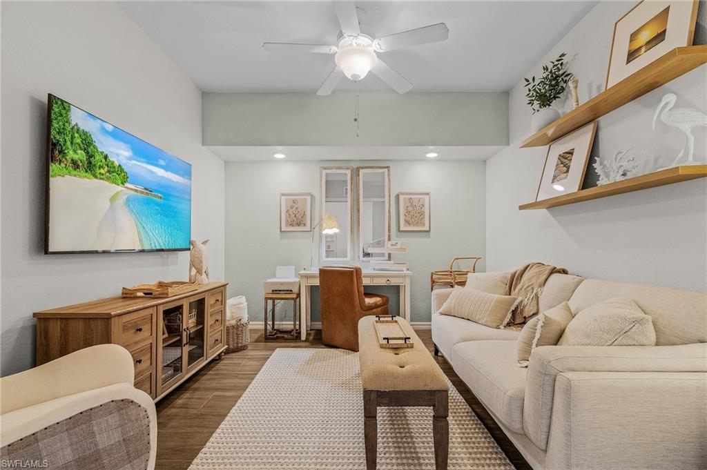 Den with sleeper sofa and desk area