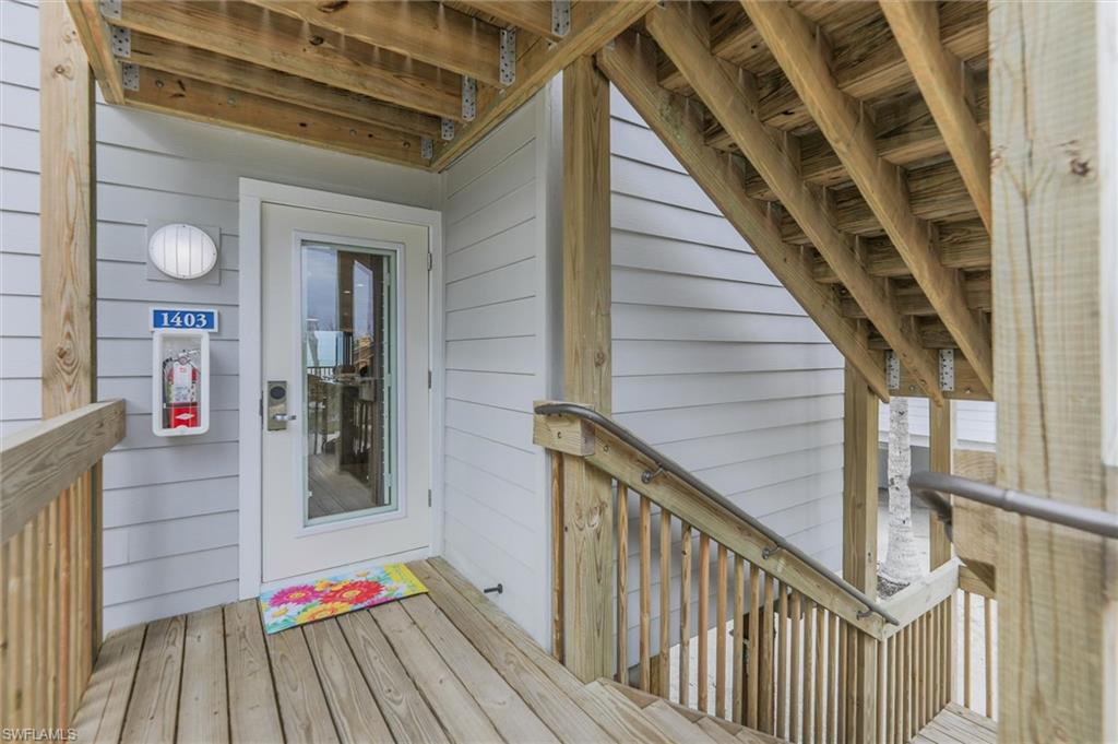 Doorway to property with a deck